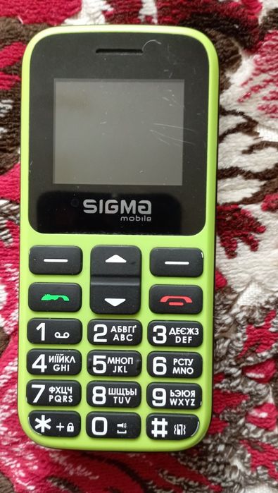 Продам телефон зелений