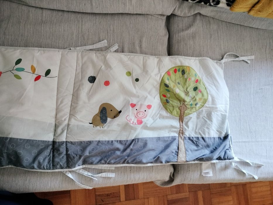 Proteção de berço e cama de grades