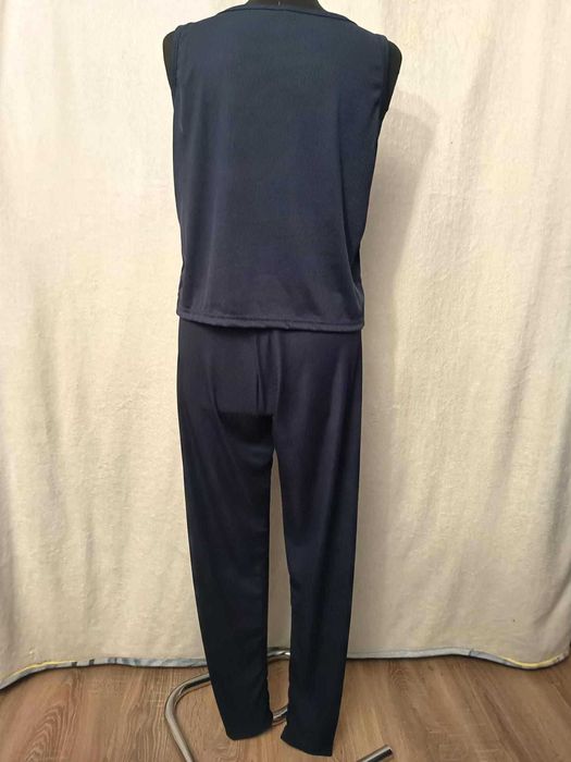 Prążkowany komplet na siłownie/ do spania
XL / 42 / 14·Bardzo dobry