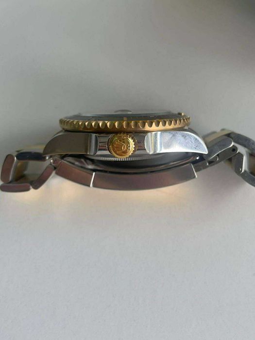 Zegarek Rolex czarno-złoty, stan doskonały