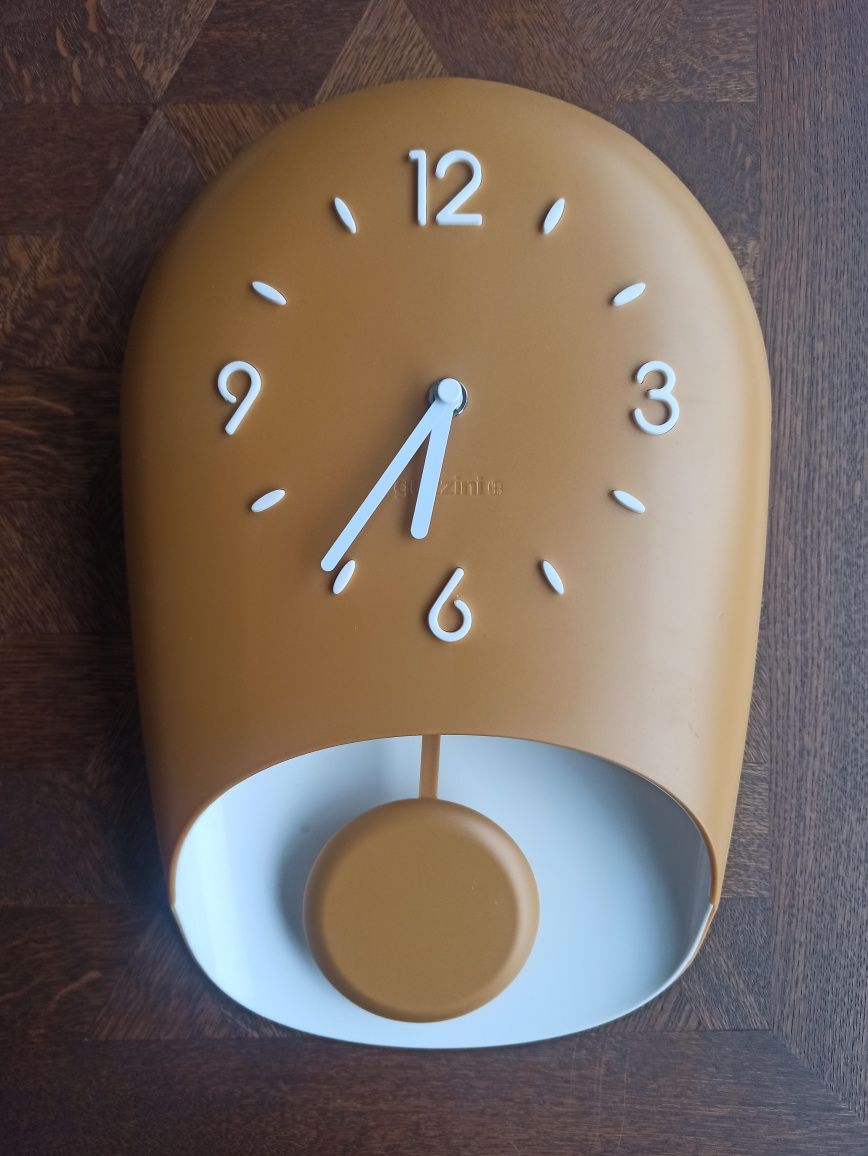 Guzzini bell włoski design zegar z wahadłem musztardowy