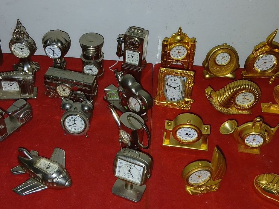Coleção Relógios minitura  dourado e prateado  por 120 €