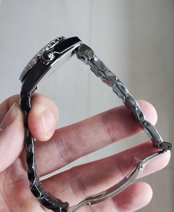 Czarny zegarek męski marki Chanel