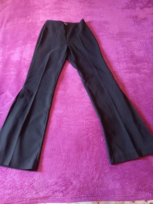 Calças clássicas cor preta