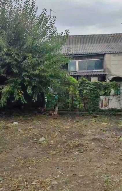 Продам кирпичный Дом на поселке  Строителей в городе Каменское.