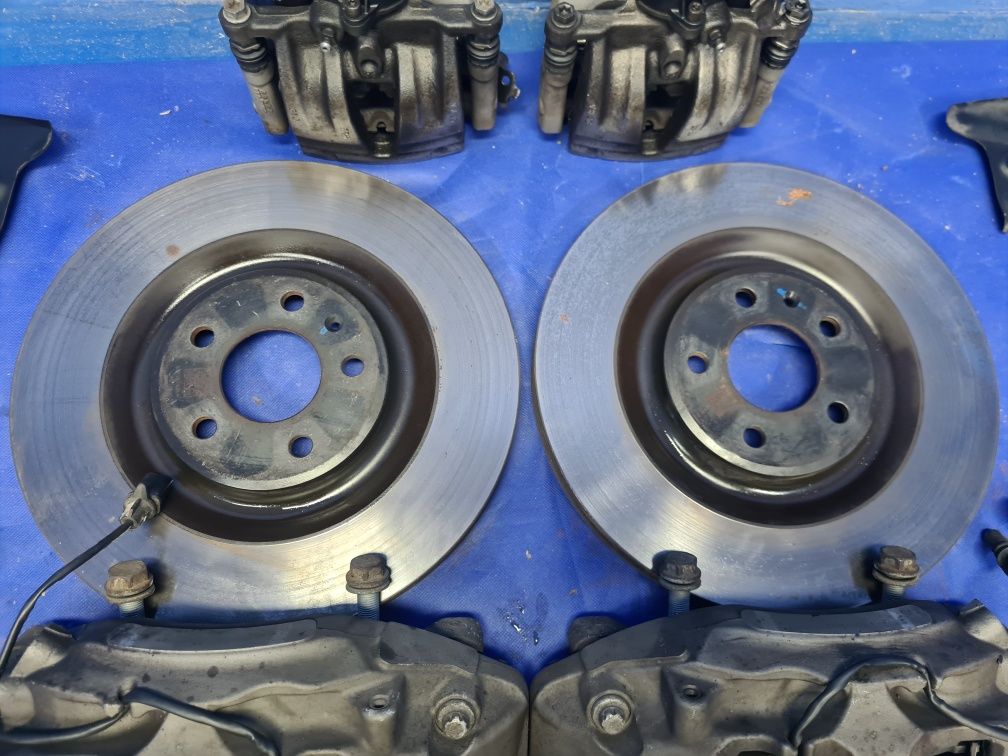 KOMPLET tarcz 375mm 340mm zaciski 6-tłoczkowe AUDI Q7 4M A6 C7 C8 OEM