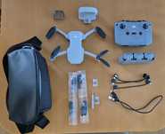 DJI Mini 4K Fly More Combo 3 baterie + dji care