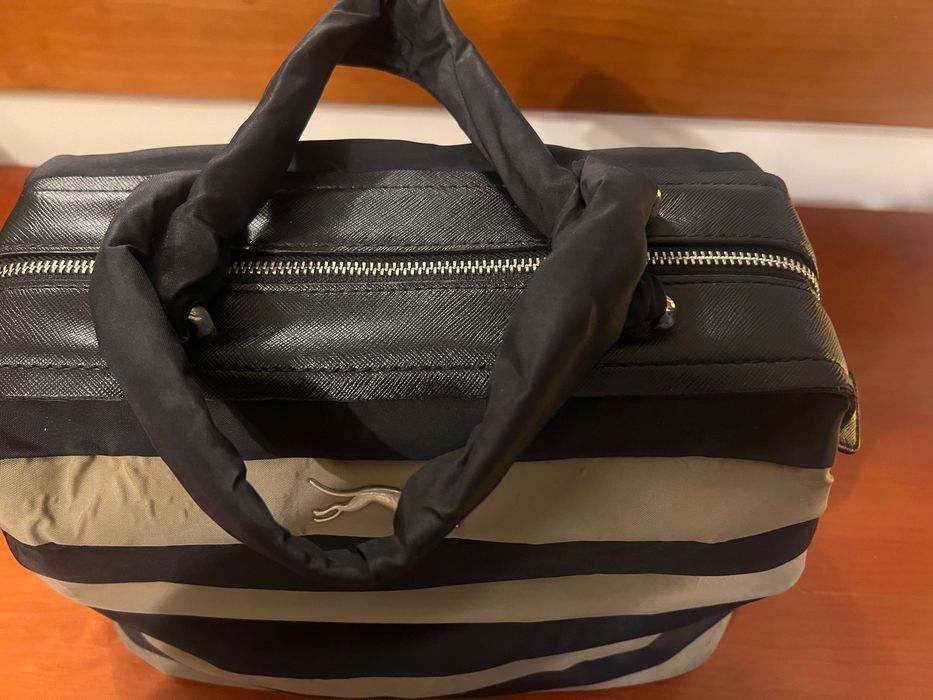 Malas usadas, mas em muito bom estado . 15& cada