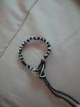 Pulseira feita a mão