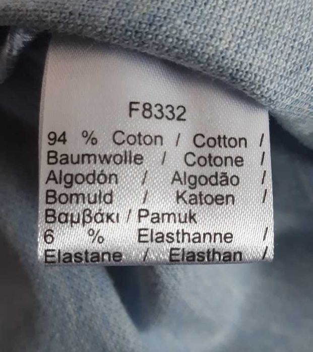 Поло голубое меланж Lacoste