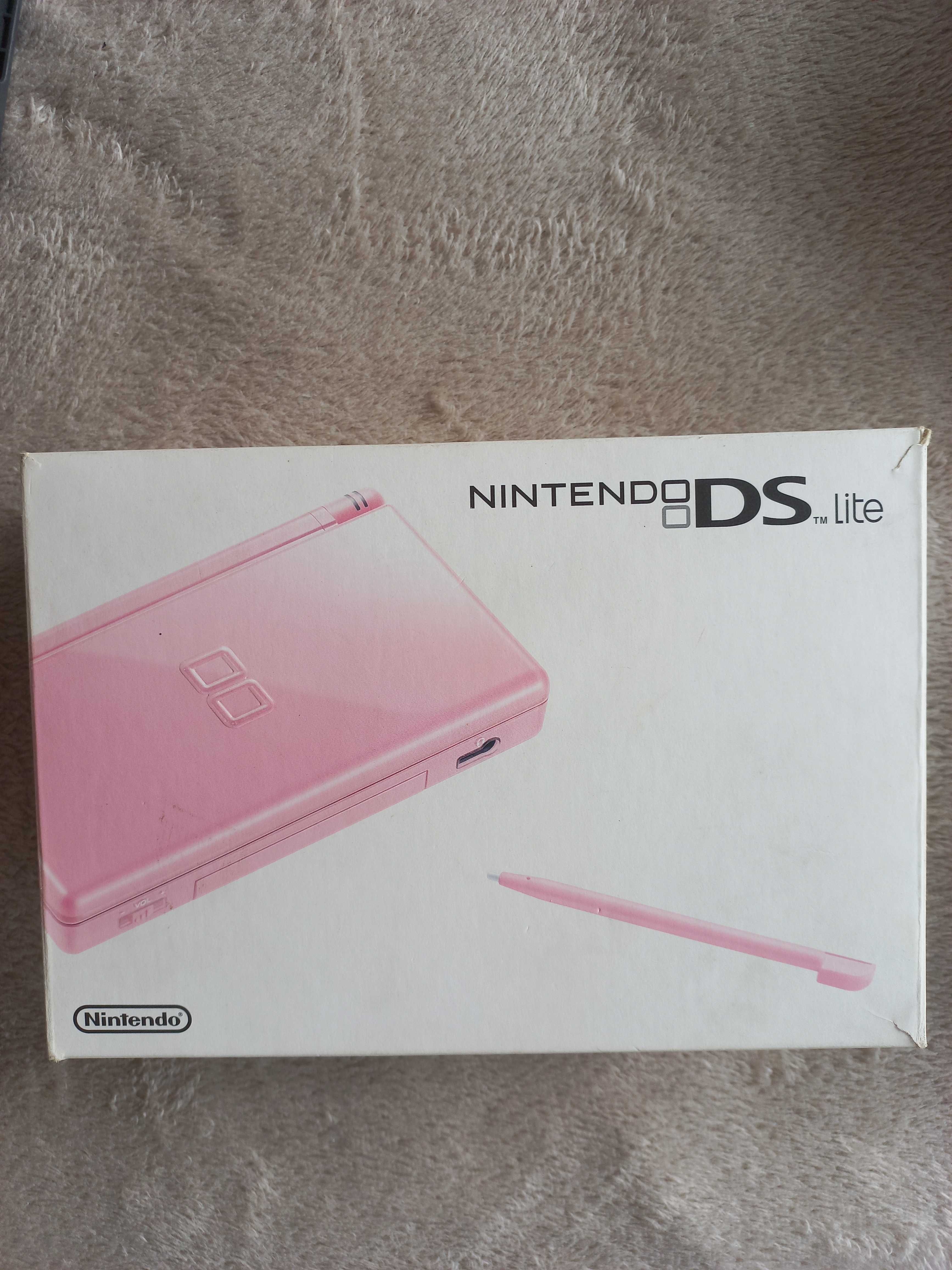 Nintendo DS cor de rosa em boas condições.