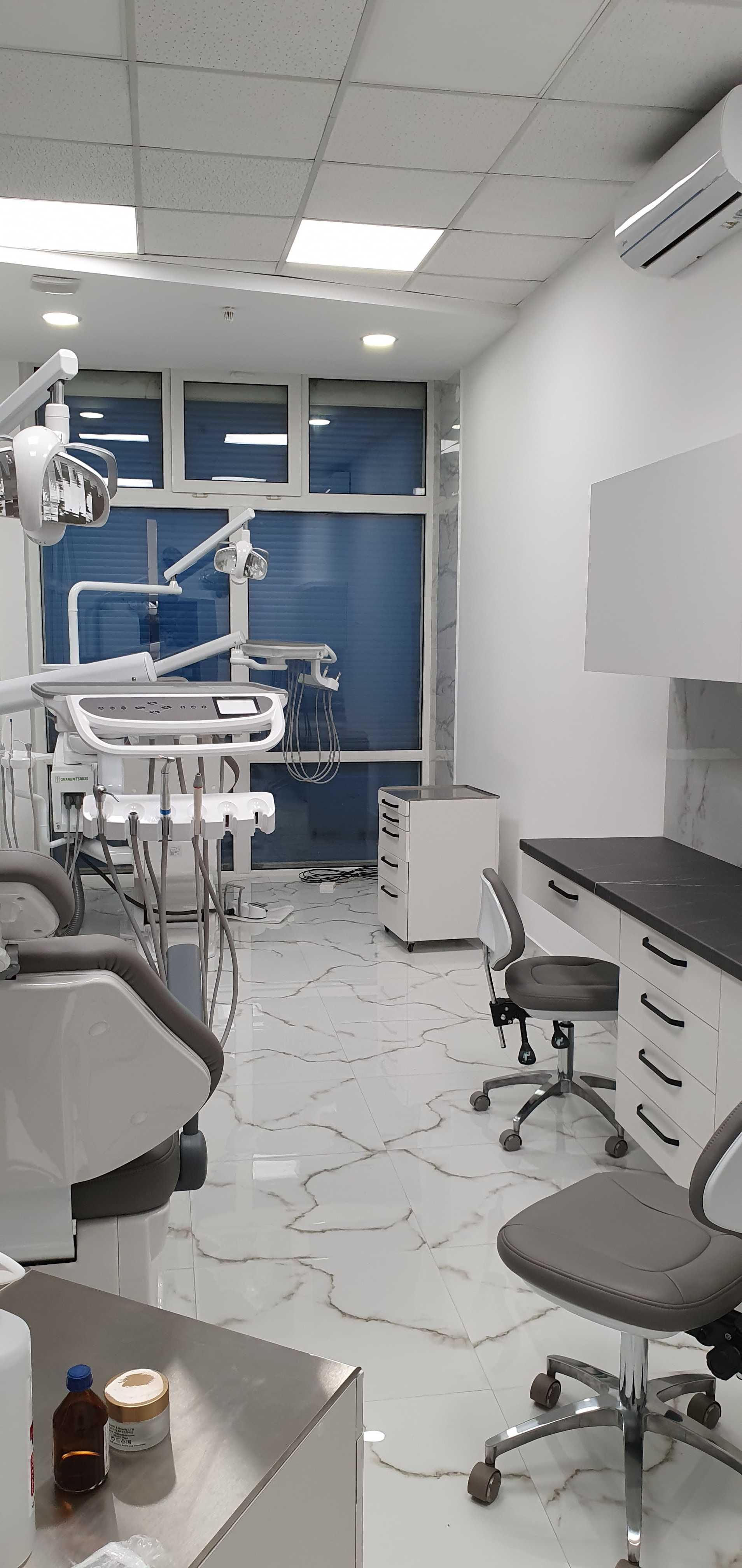 Стоматолог Стоматологічні послуги Trust Dental імплантація  брекети