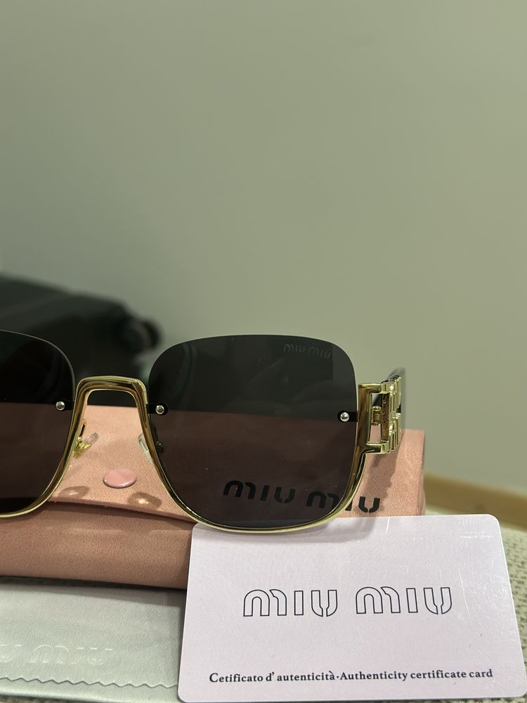 oculos miumiu em caixa