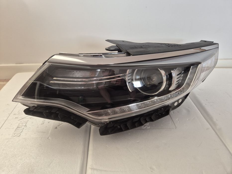 Kia Optima reflektor lewy xenon