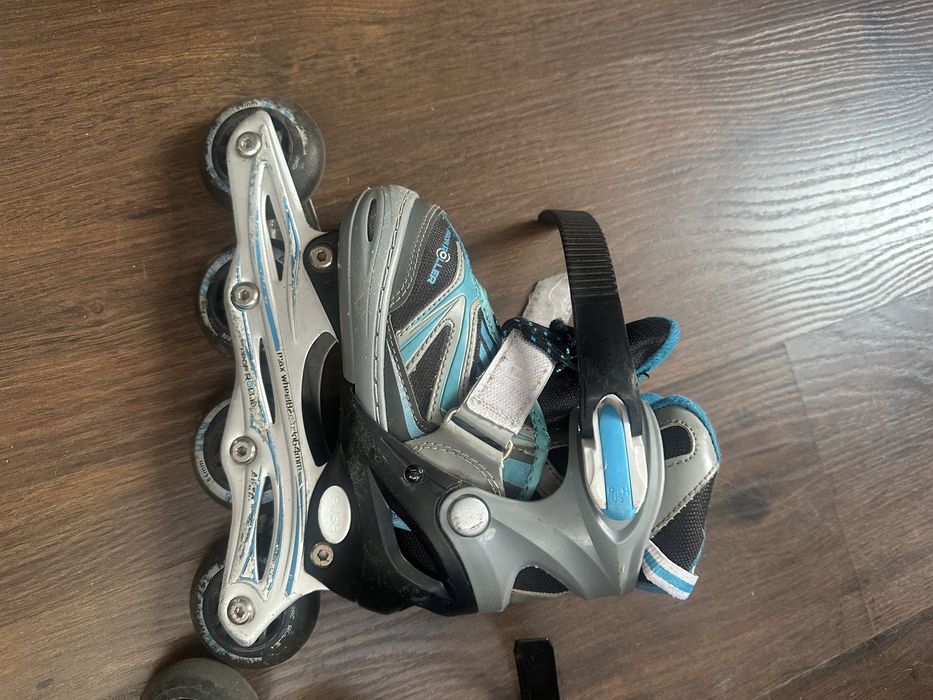 Ковзани роликові б/у