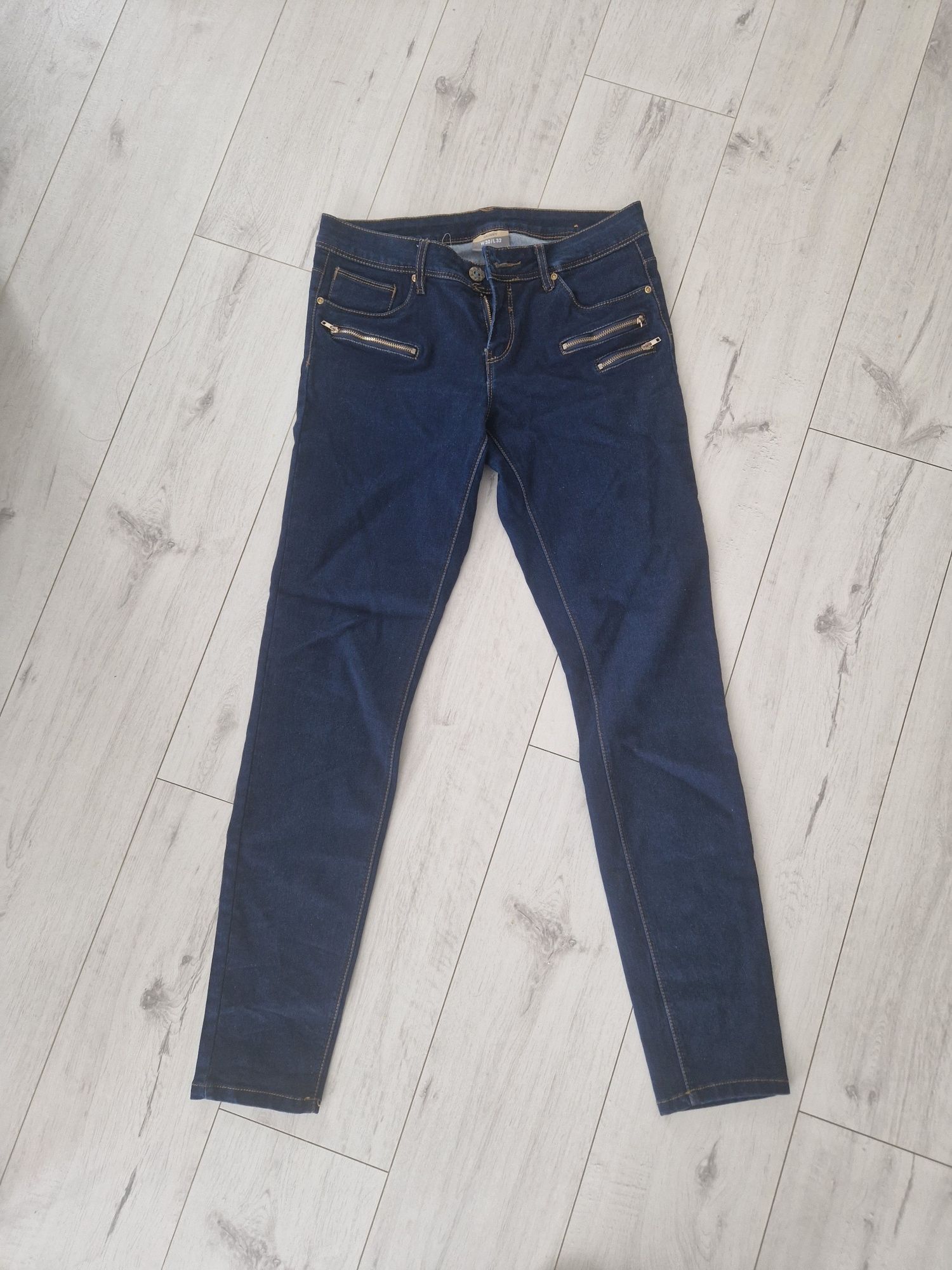 Ciemne dzinsy rurki skinny Takko fashion 30/32