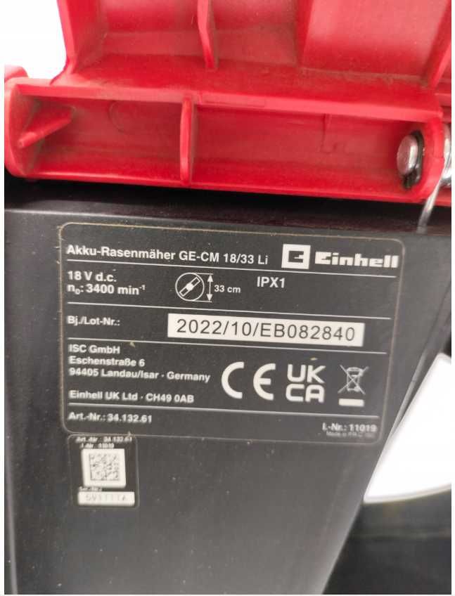 Kosiarka akumulatorowa Einhell GE-CM 18/33 z baterią i ładowarką.