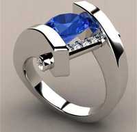 Prześliczny oryginalny pierścionek z niebieską cyrkonią kolor srebrny
