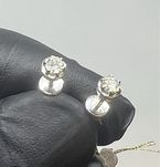 Золоті сережки на закрутках 0.27 карат. Бриллианты.