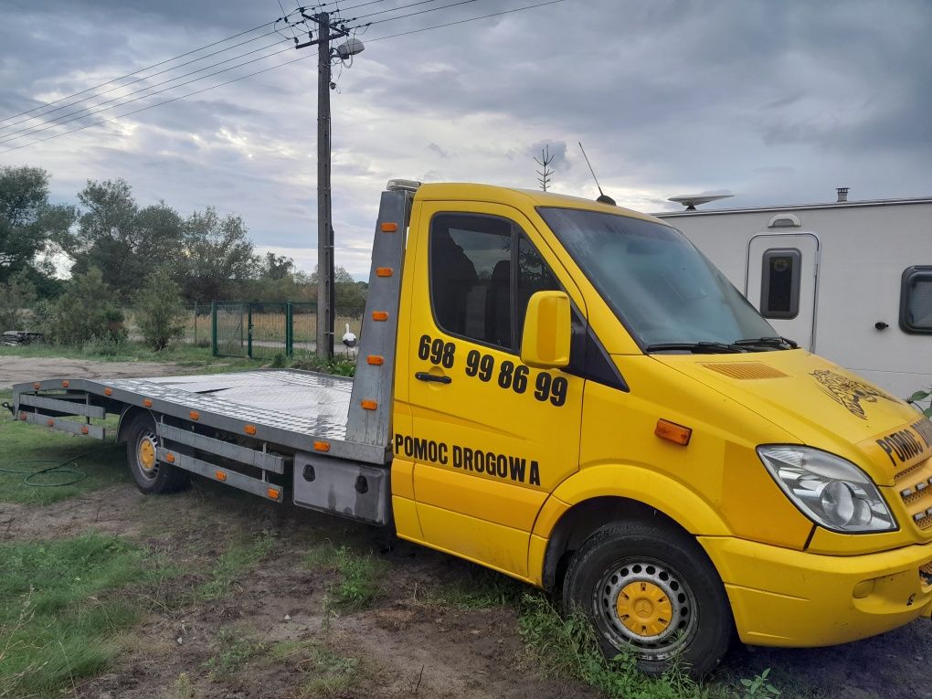 Laweta transport,pomoc drogowa,usługi transportowe,