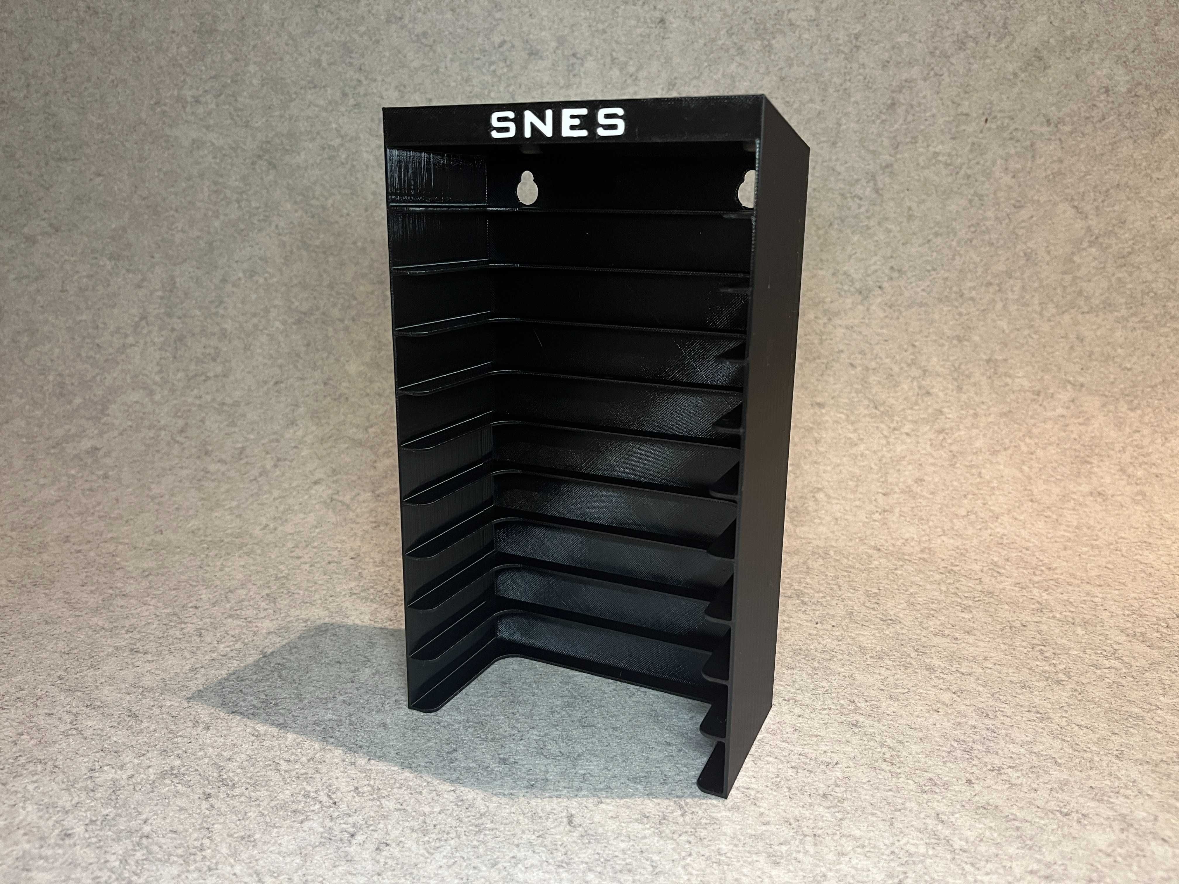 Stojak / wieszak scienny na gry Super Nintendo SNES