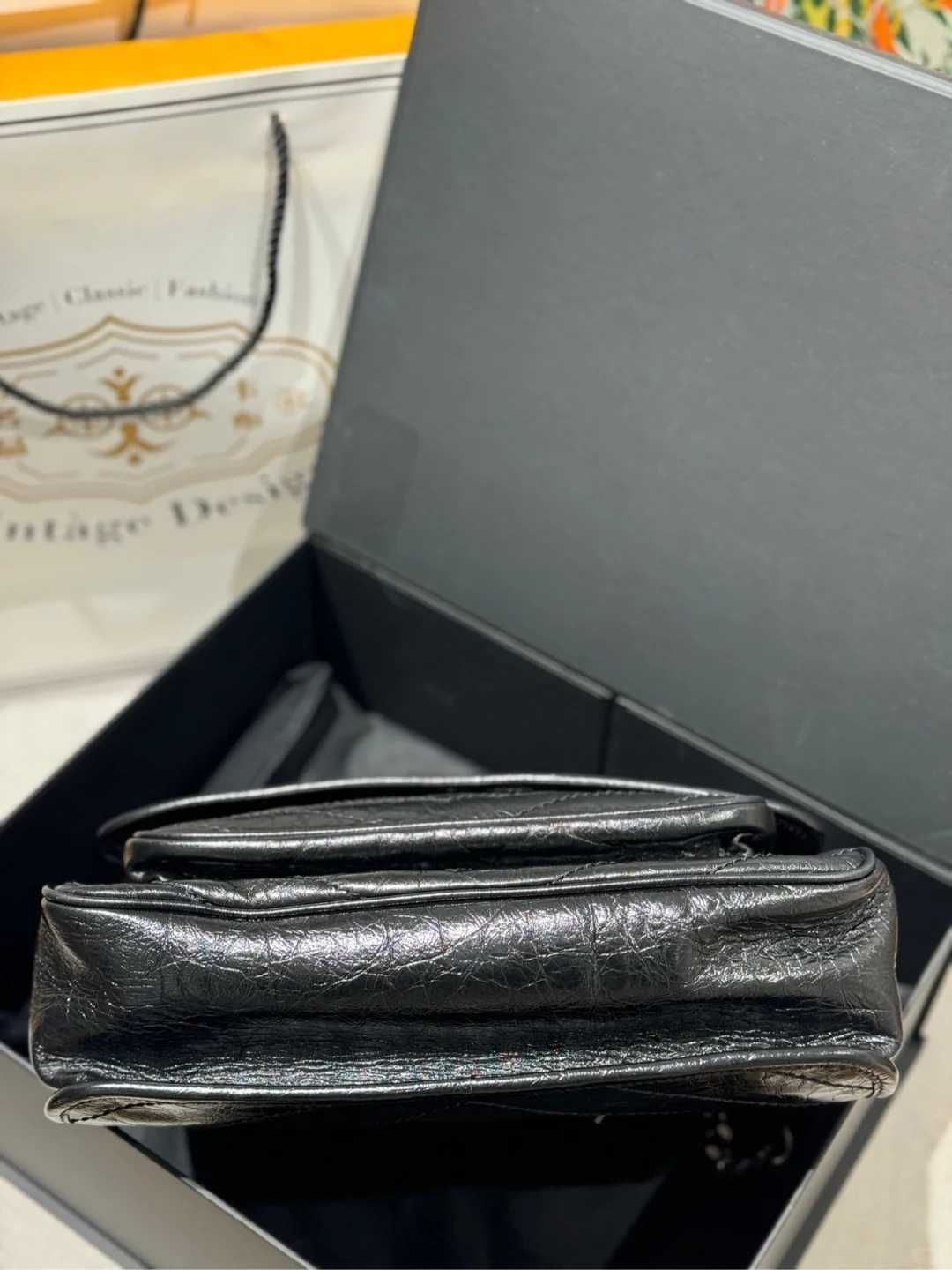 Średniej wielkości skórzana torebka Yves Saint Laurent Niki