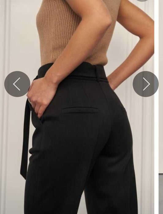 Теплі брюки класичні, завужені до низу з тканини Твід вовна.