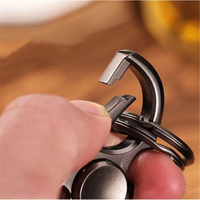 Fidget spinner, keychain/bottle opener, stress relief gadget,
