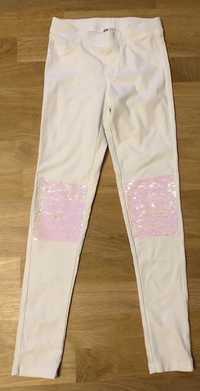 Spodnie białe z cekinami biało-różowymi na kolanach H&M r.152 od 12 la