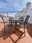 Mesa com cadeiras de exterior