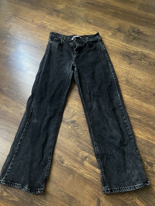 Женские черные джинсы клеш