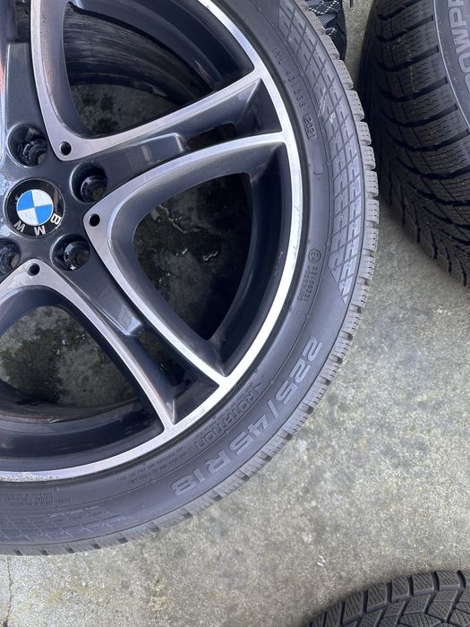 Felgi aluminiowe do bmw  z oponami zimowymi 18