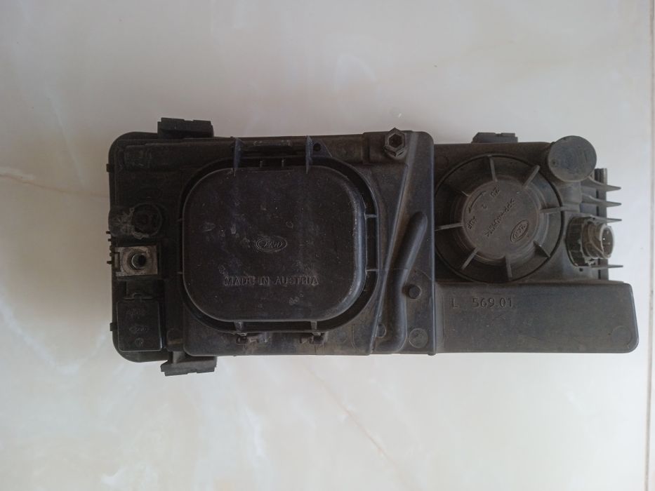 корпус  фари та корпус бордюрного дзеркала МАН