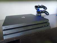 Ps4 pro +2 pady +ładowarka+4 gry