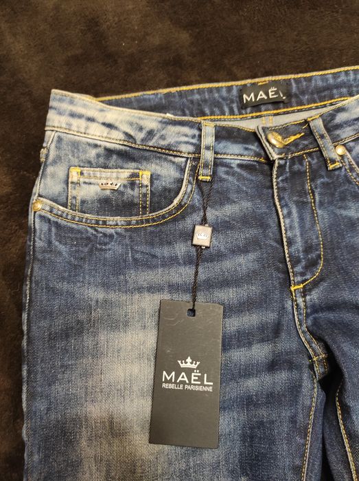 Нові класичні сині джинси розмір М