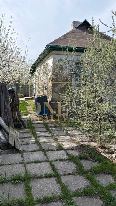 Будинок з зем. ділянкою 13.38 соток в центрі села Велика Олександрівка