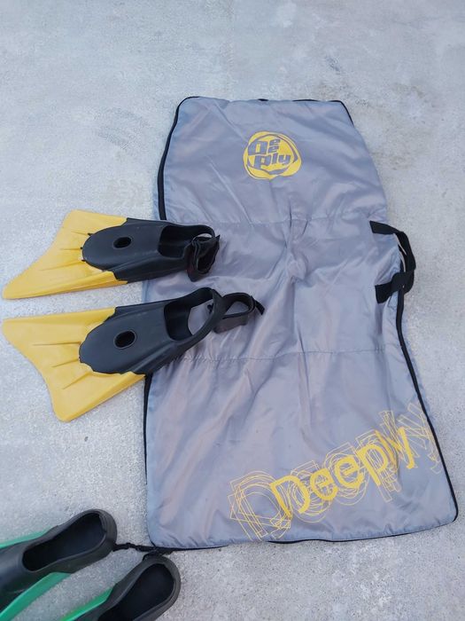 Saco de prancha e pés de pato