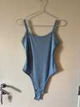 Body azul claro, tamanho S/M