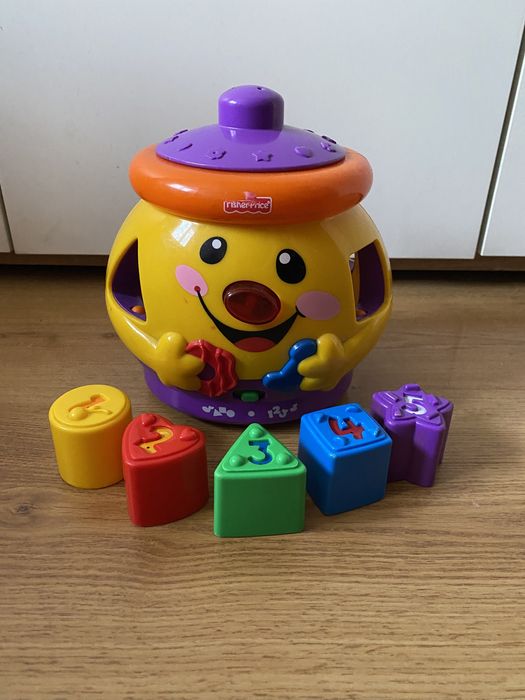 Garnuszek Fisher Price