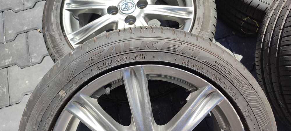 16"6J 4x100 koła Toyota Yaris Vitz, z oponami letnimi Falken 195/50R16
