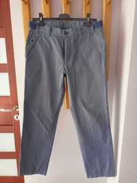 Szare materiałowe męskie spodnie Reserved