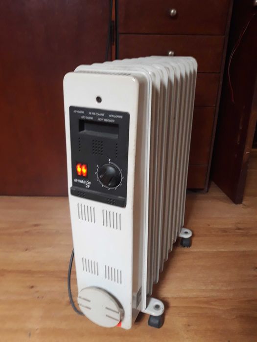 Aquecedores eletricos a oleo  em perfeito estado de funcionamento