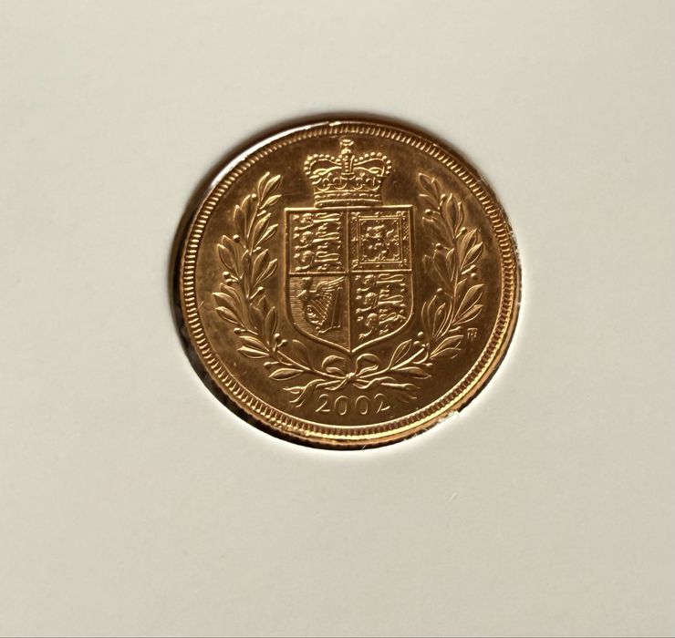 Moeda de ouro Libra Brasão 2002