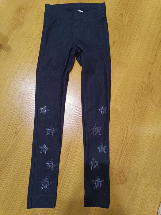 Spodnie H&M z gwiazdkami 134