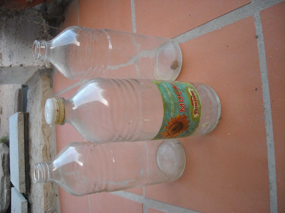 Conjunto garrafas vidro antigas litro forma original - oleo Mucai