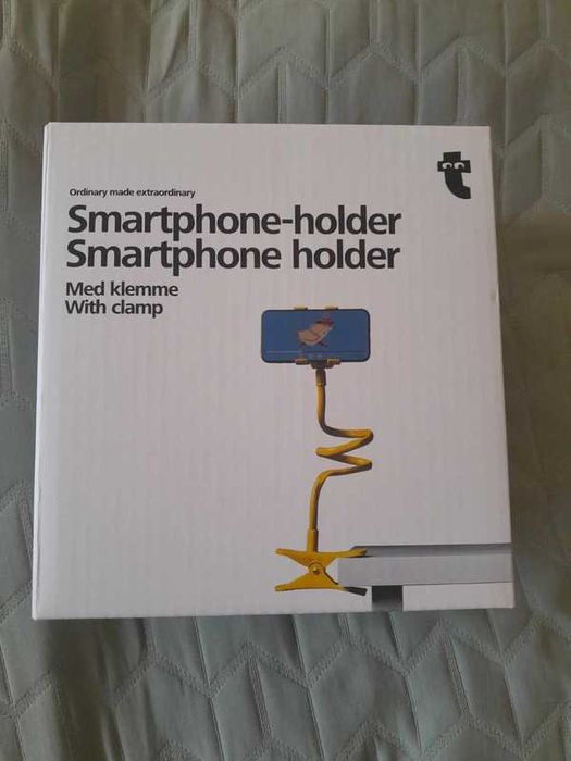 Nowy Żółty uchwyt do smartfona z uciskiem firmy Flying Tiger.