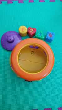 Garnuszek na klocuszek - Fisher Price