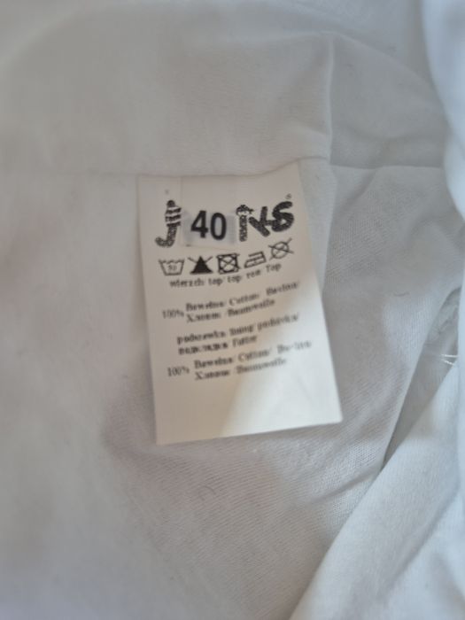 Biala czapeczka dla Niuni 40