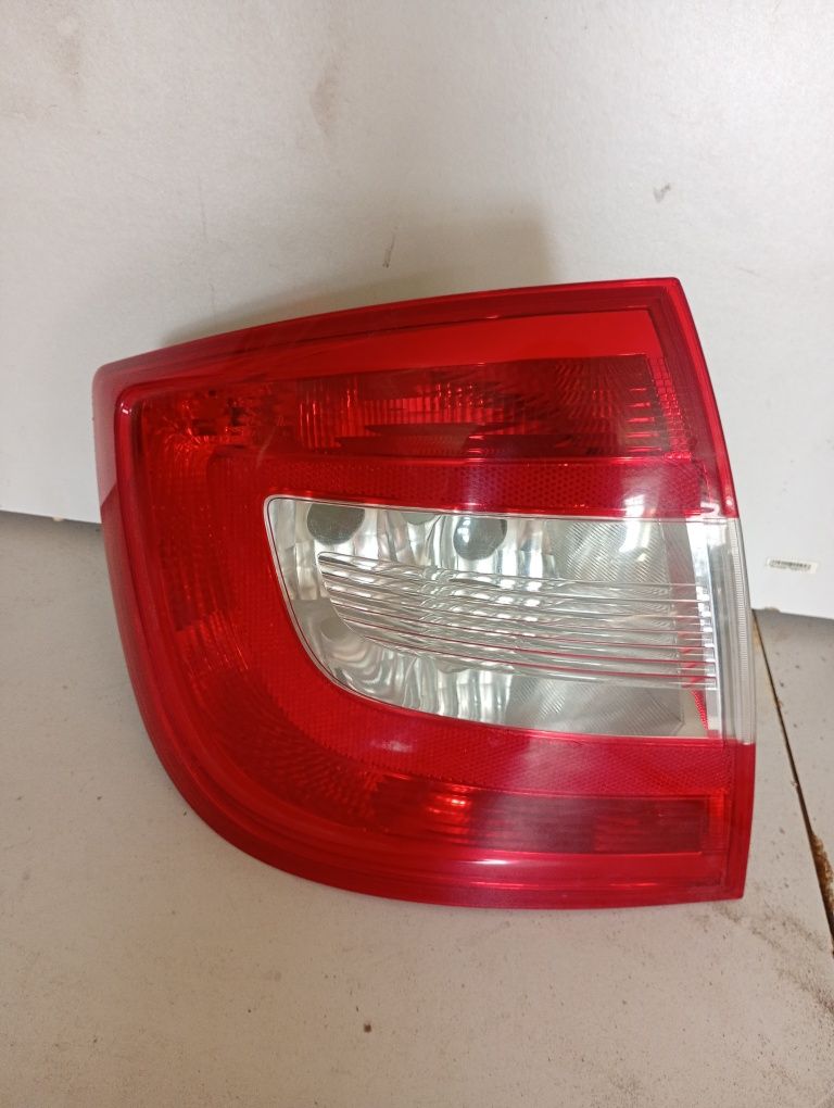 Фонарь задний левый Skoda rapid