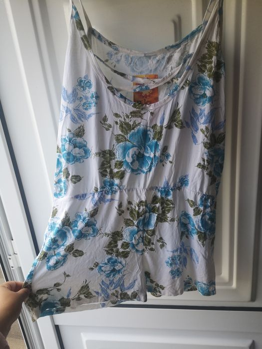 Macacão novo com etiqueta